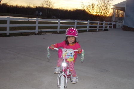 Kasen riding her bicycle